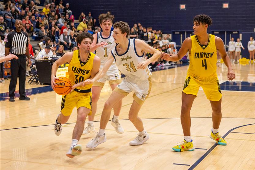 Students play basketball